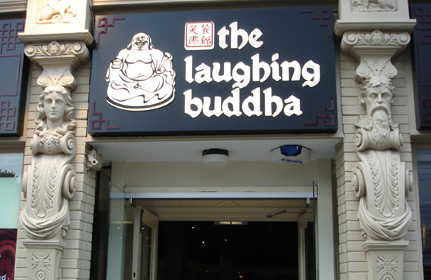 Laughing Buddha Restaurant sign