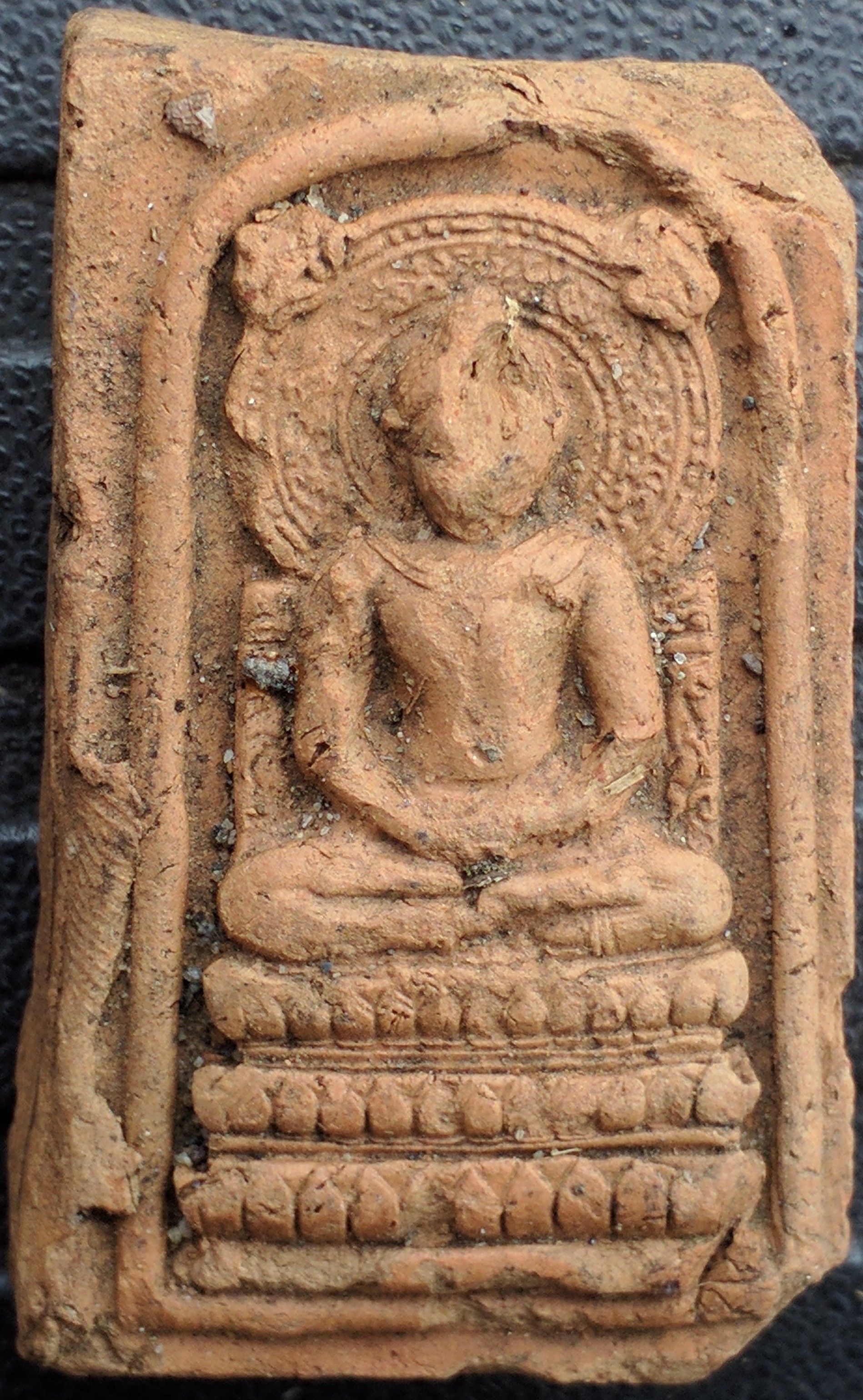 Side one of tile